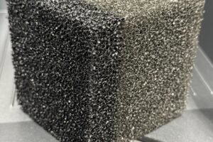 Coatings for reticulated polyurethane foam