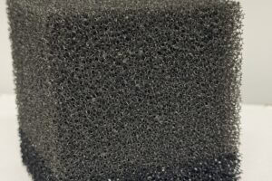 Coatings for reticulated polyurethane foam
