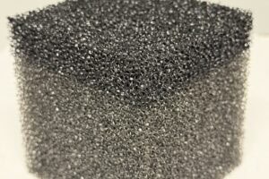 Reticulated polyurethane foam structure